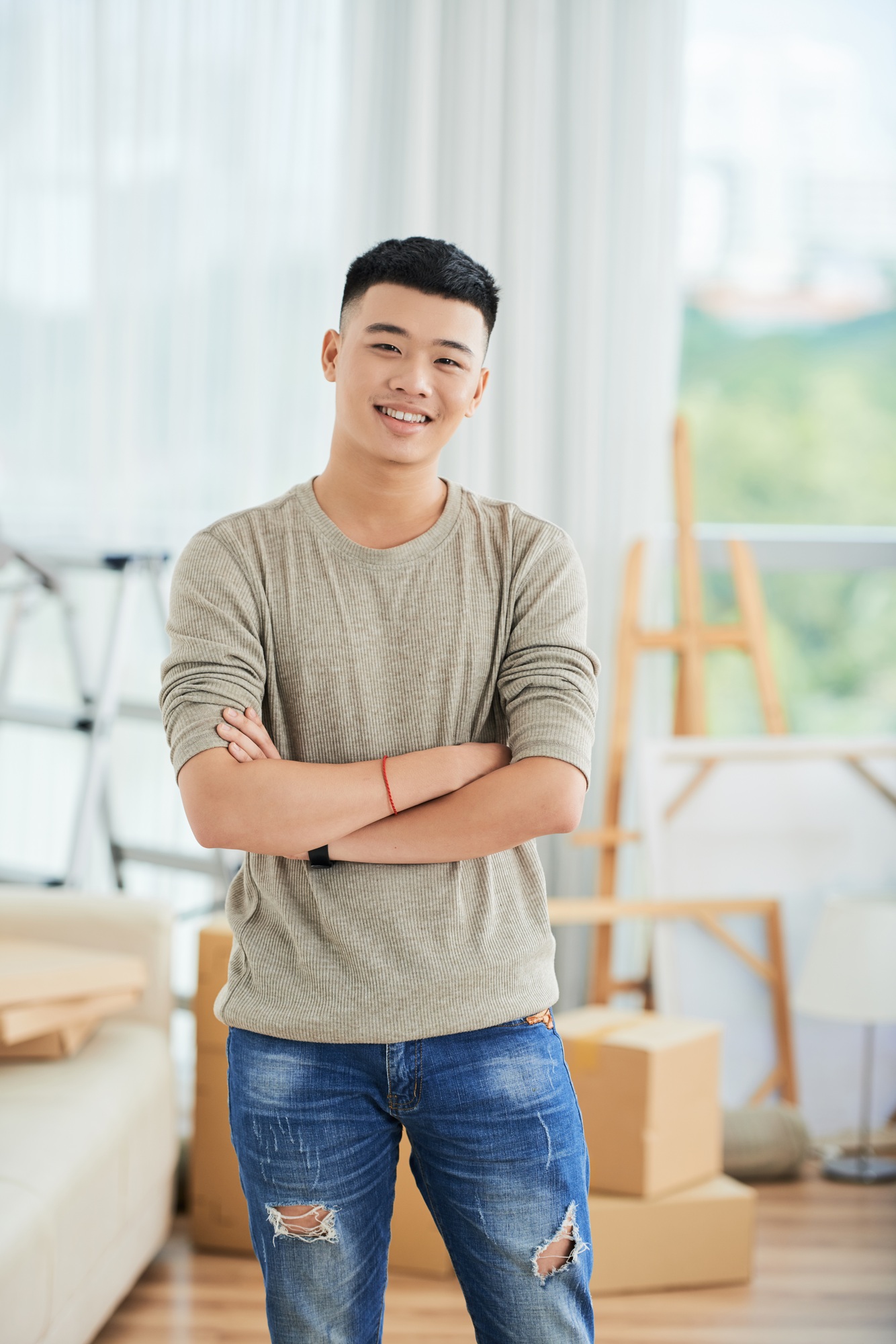 Asian man at home